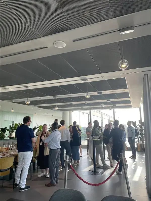 Attendees network at "The Future of Pharmaceutical Marketing in the Era of Data & AI" event.